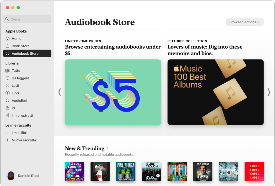 Una finestra dell’app Libri che mostra la sezione Audiobook Store selezionata nella barra laterale, con categorie di titoli sulla destra, tra cui “Nuovi e di tendenza” e gli audiolibri in offerta a tempo limitato.